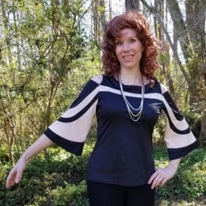 Cold shoulders, black and cream, flared sleeve top